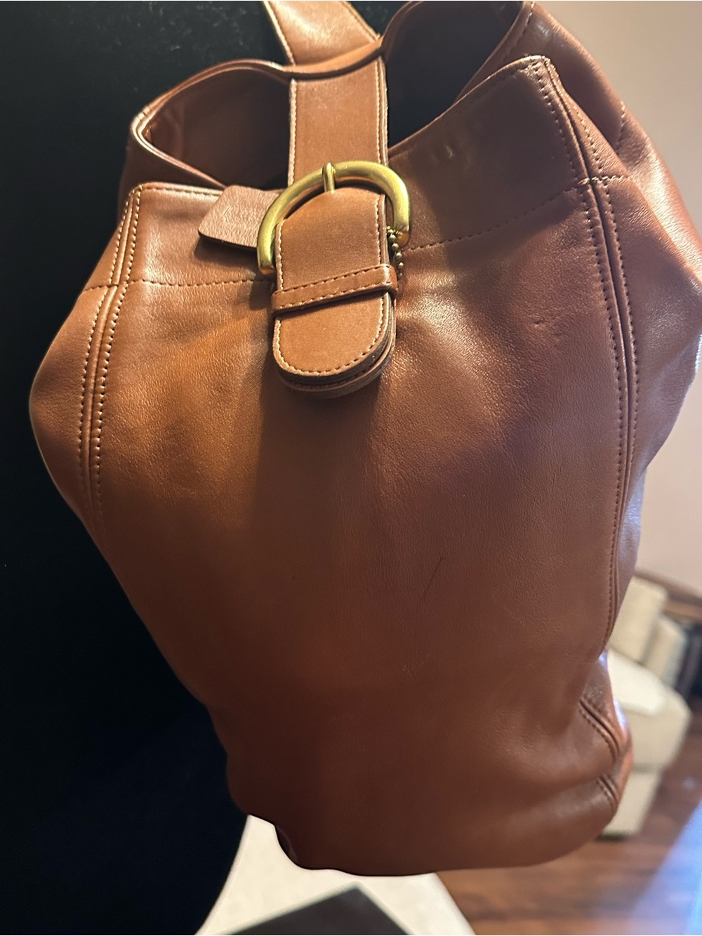 1997- Women's Tan Leather Bucket Bag with Buckle Accent